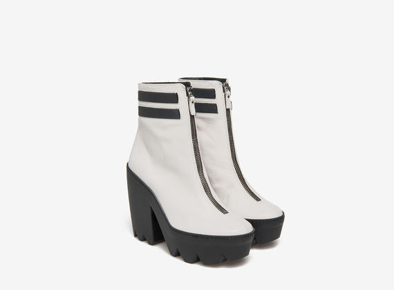 Zip ankle boots with elasticated band