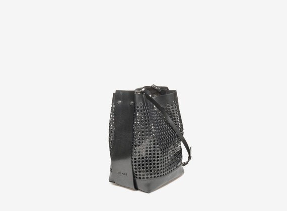 Laminated perforated leather satchel