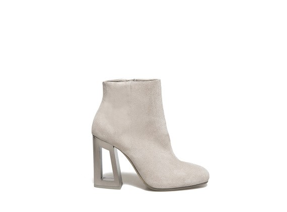 Suede ankle boot with metallic perforated heel