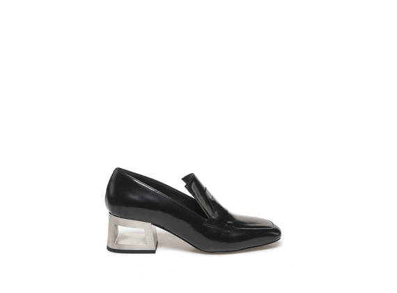 Black loafer with steel-coloured perforated heel