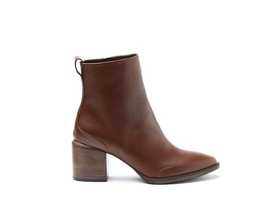 Cognac-coloured ankle boots with leather-covered heel