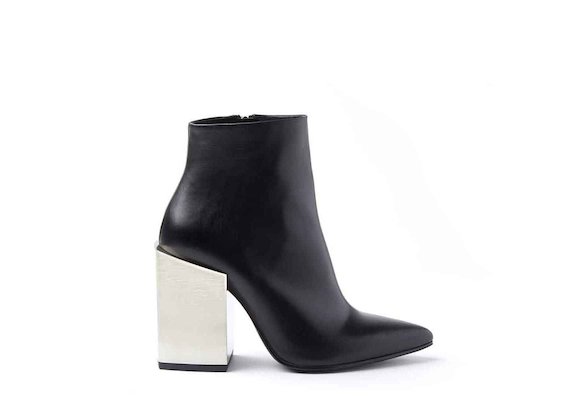 Black leather heeled ankle boots with high metallic block heel