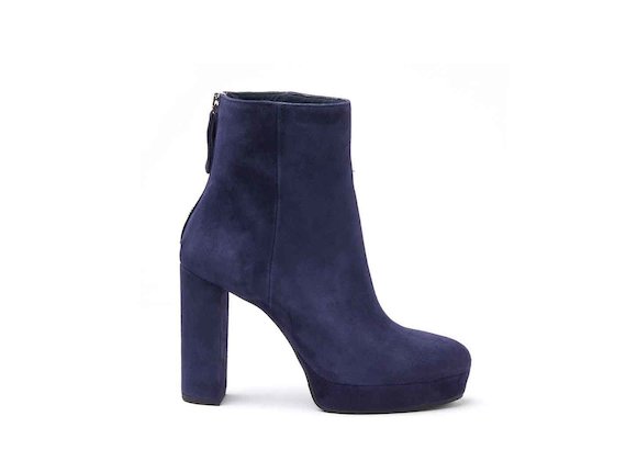 Navy blue suede heeled ankle boots with suede-covered platform and heel