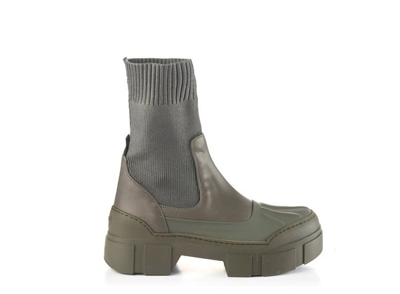 Khaki ankle boots in rubberised leather and knit fabric with lugged sole
