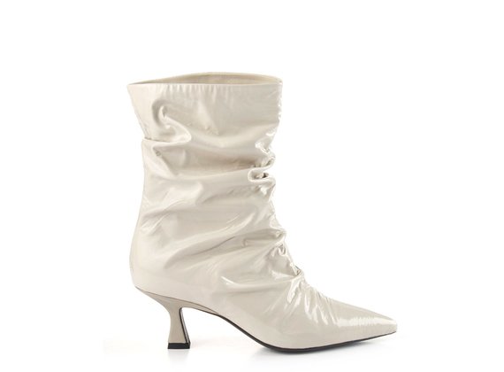 Tapered tube ankle boots in ice-white patent leather